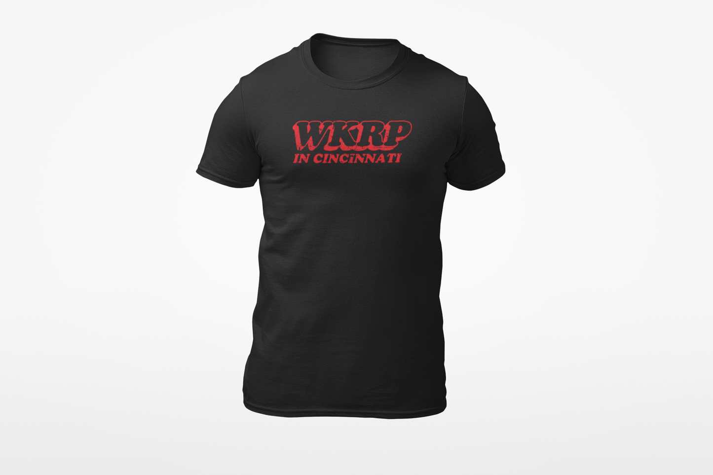 Black shirt with red retro text: “WKRP in Cincinnati”.