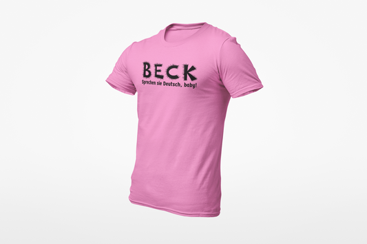 Pink shirt with “BECK – Sprechen sie Deutsch, baby!” in spiky black font.