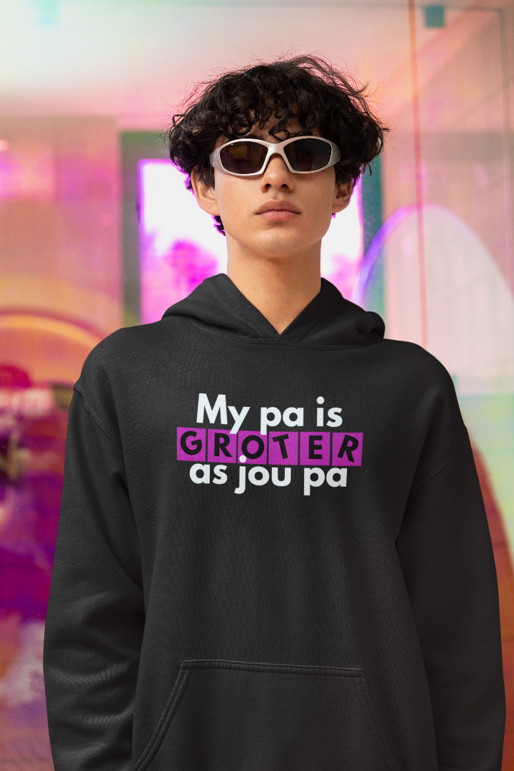 gildan-hoodie-mockup-featuring-a-serious-man-posing-in-a-new-pop-wave-inspired-setting-m38769