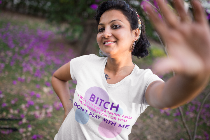 model is wearing a white t-shirt with the words bitch i will put you in a trunk and help people look for you don't play with me