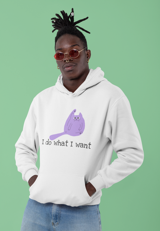 model in a white hoodie that has a picture of a cat licking its arse and the words i do what I want
