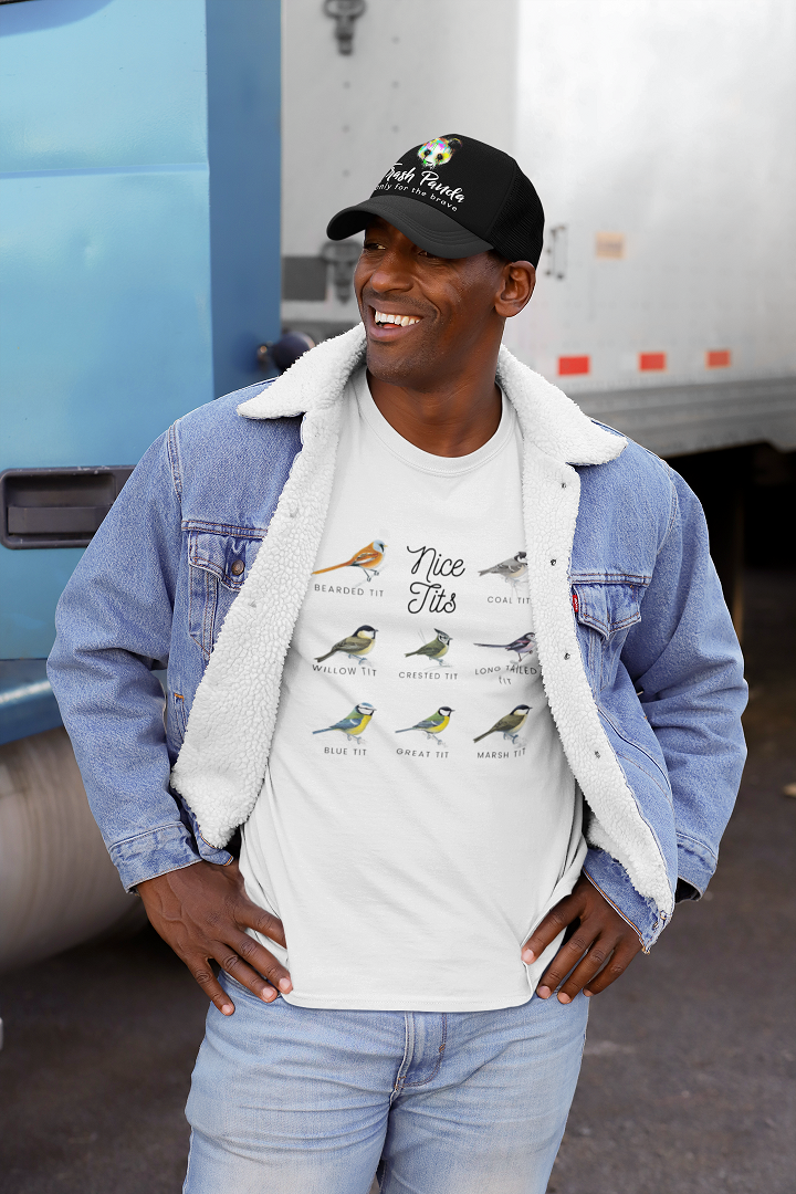 young man wearing a denim jacket over a white tshirt with 8 different Tit birds on it and the words Nice Tits